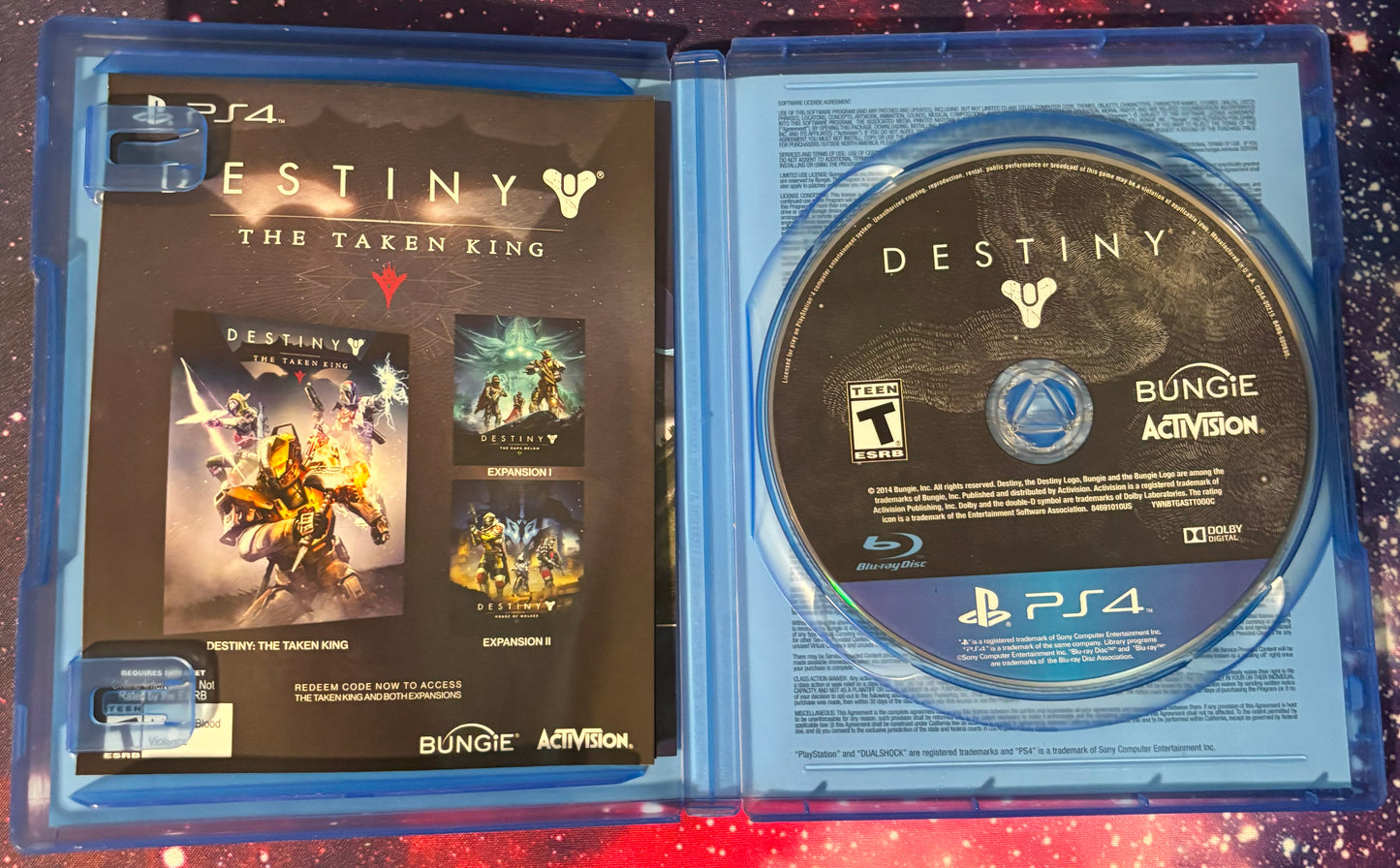 PlayStation 4 game case for 'Destiny: The Taken King' with disc inside