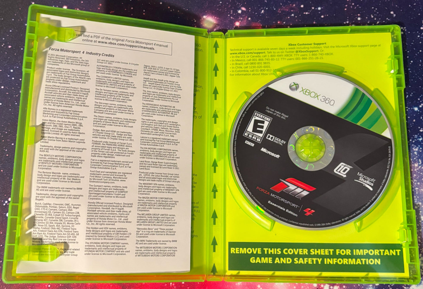 Xbox 360 game disc in a green case with safety information sheet