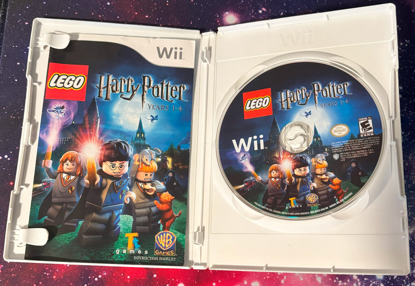 LEGO Harry Potter Wii game case and disc on a starry background
