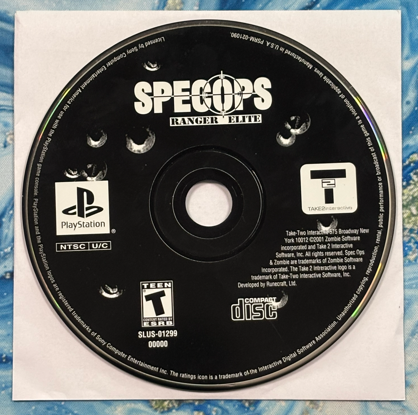 PlayStation game disc labeled 'SPECOPS Ranger Elite' on a textured surface