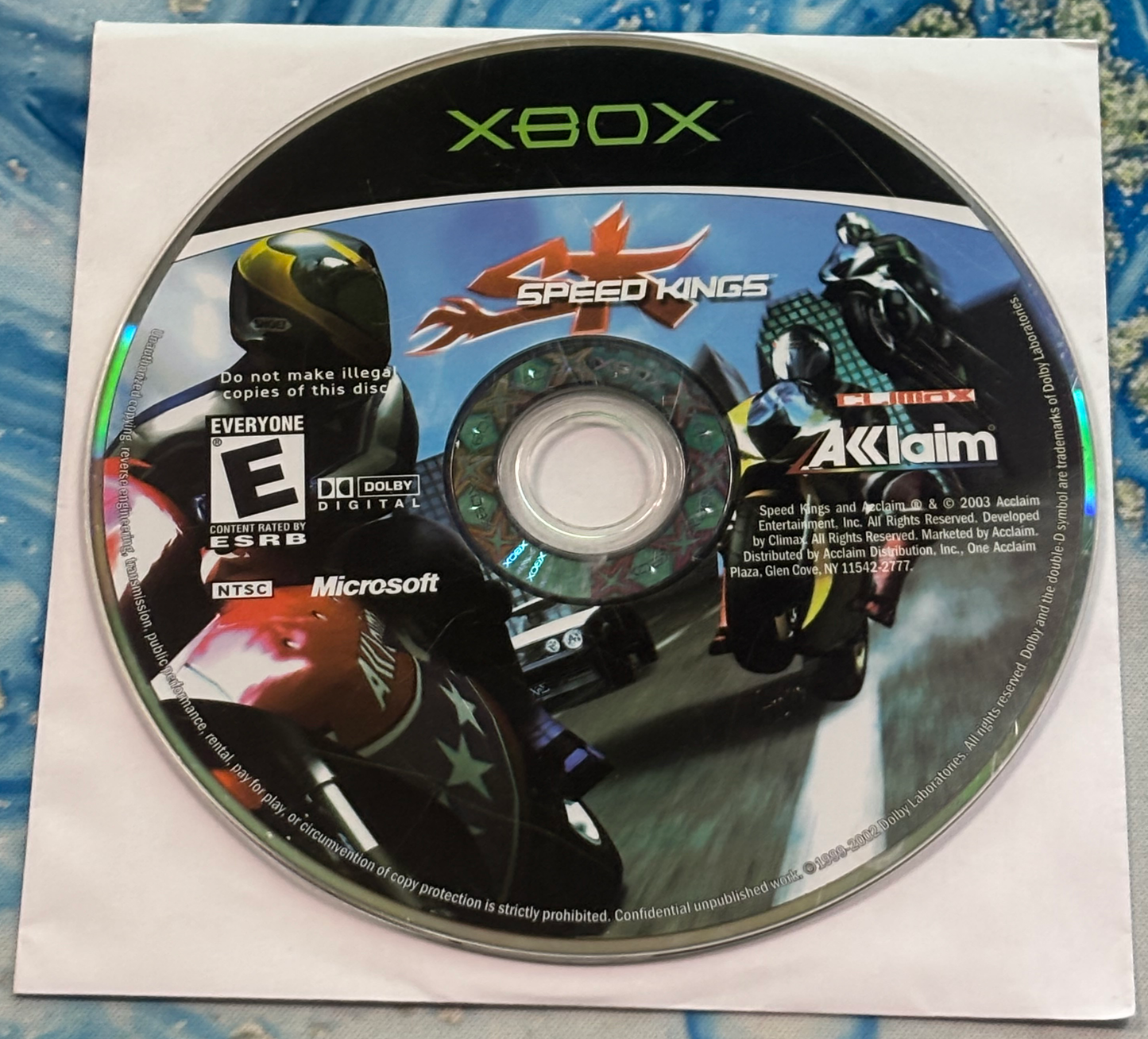Xbox game disc for '4 Speed Kings' on a white background