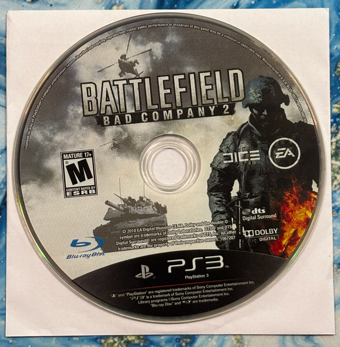 Game disc for 'Battlefield: Bad Company 2' on a PlayStation 3 console.
