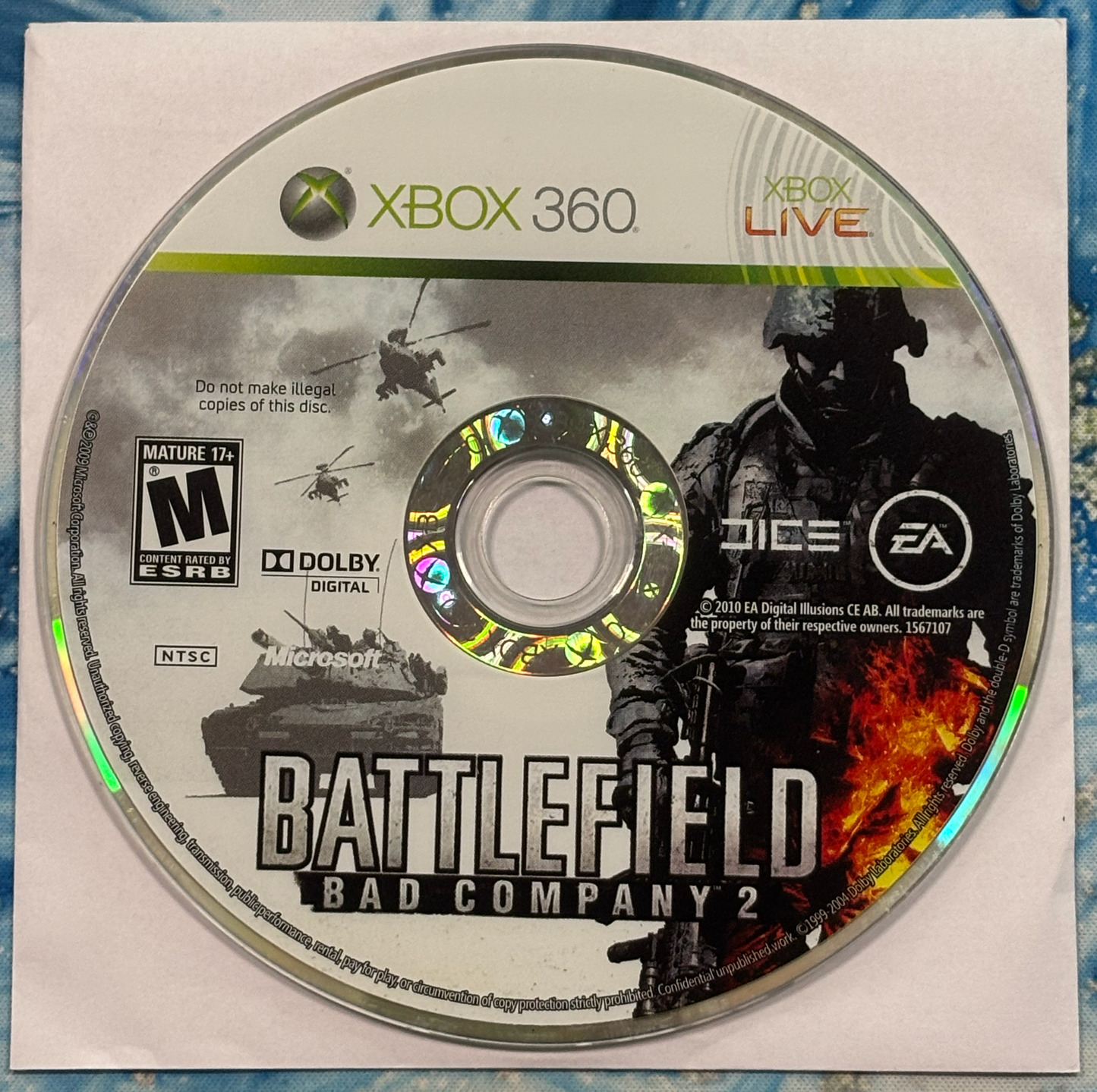 Game disc for 'Battlefield: Bad Company 2' on Xbox 360 with game cover and branding.