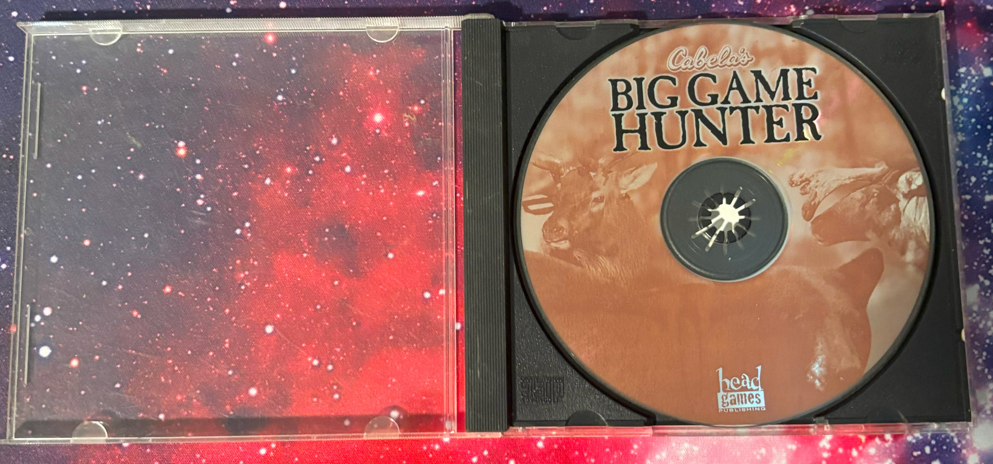 CD with 'Big Game Hunter' cover and red and black case