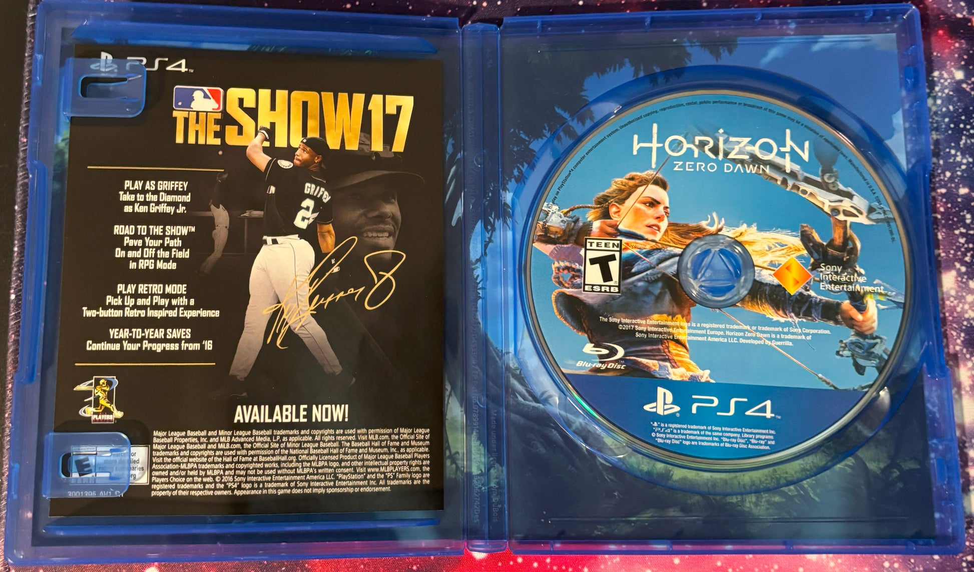 PlayStation 4 game disc and cover for 'The Show 17' and 'Horizon Zero Dawn'.