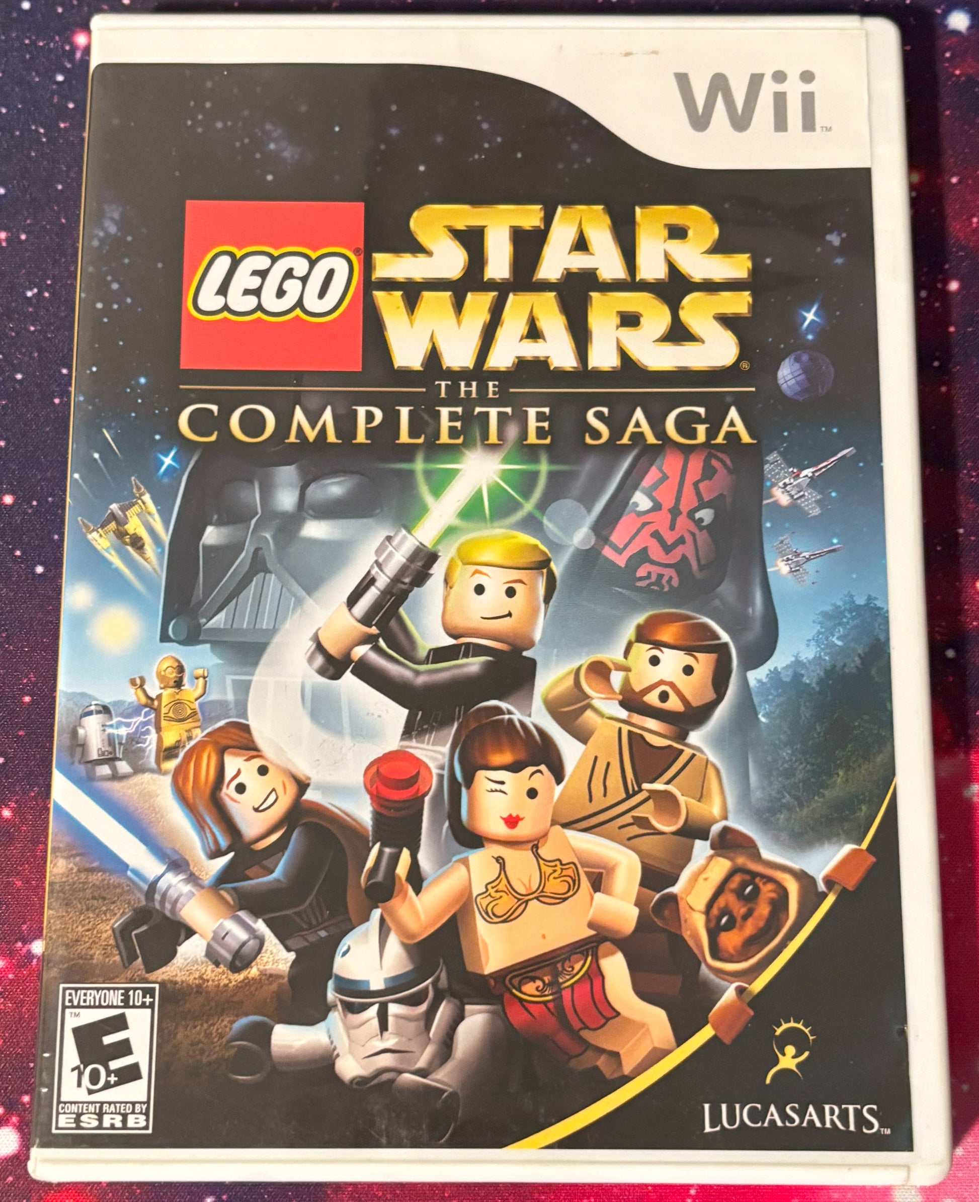 LEGO Star Wars: The Complete Saga game case for Wii with characters and branding.