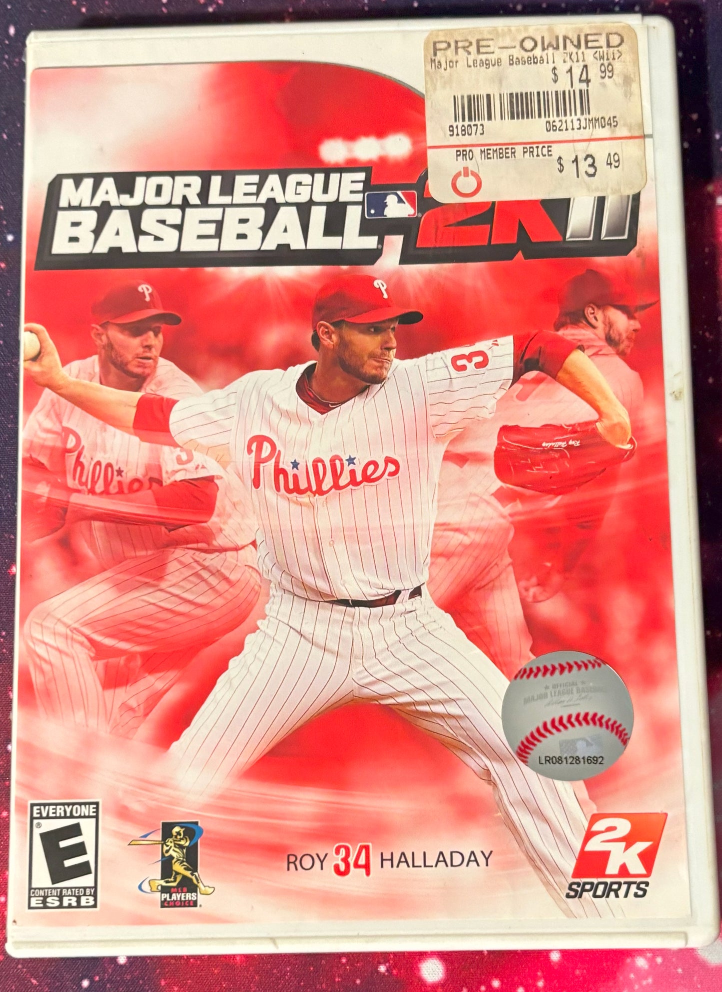 Video game case for 'Major League Baseball 2K11' featuring a player in a Phillies uniform.