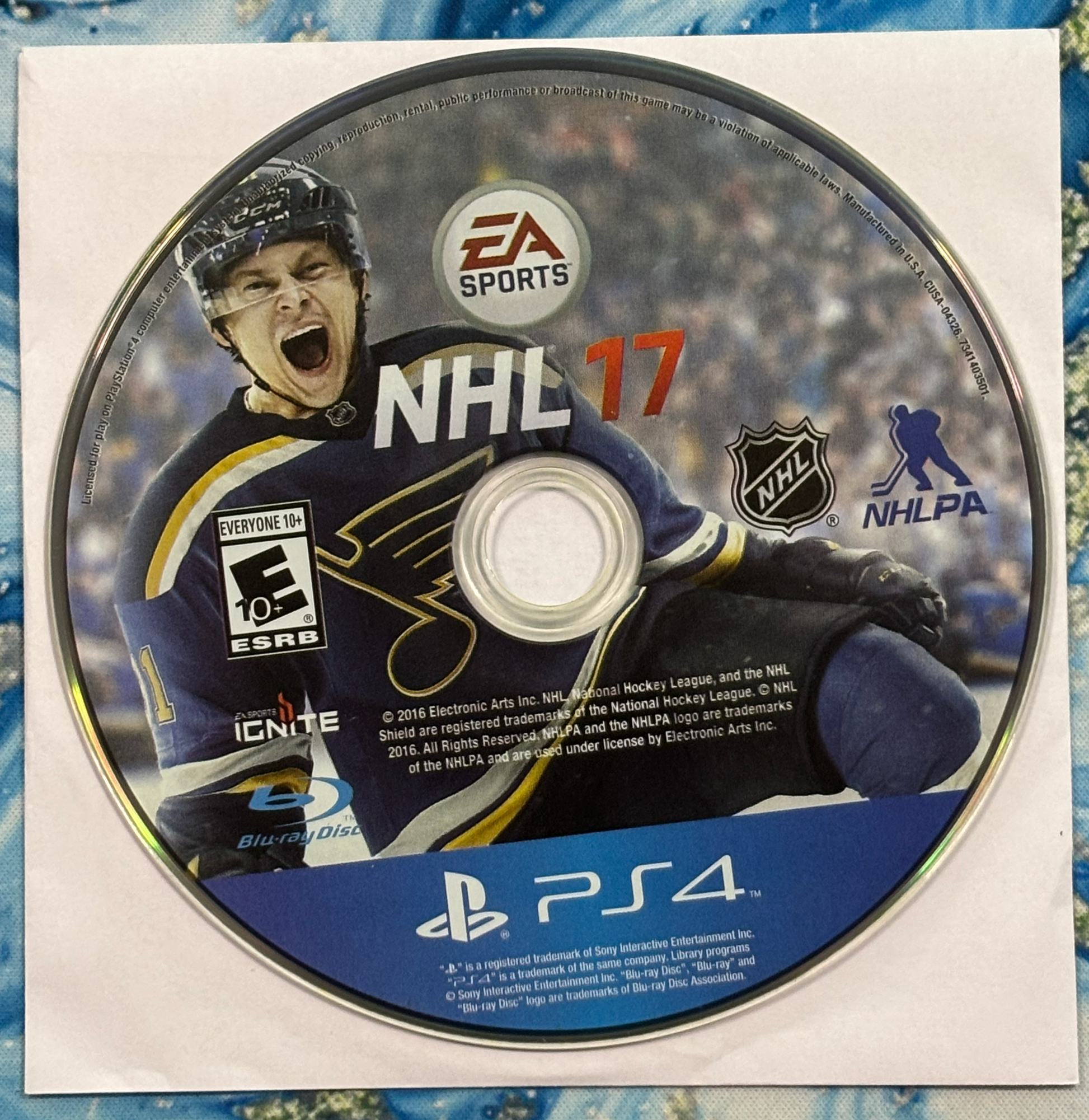 NHL 17 game disc for PlayStation 4 with EA Sports branding