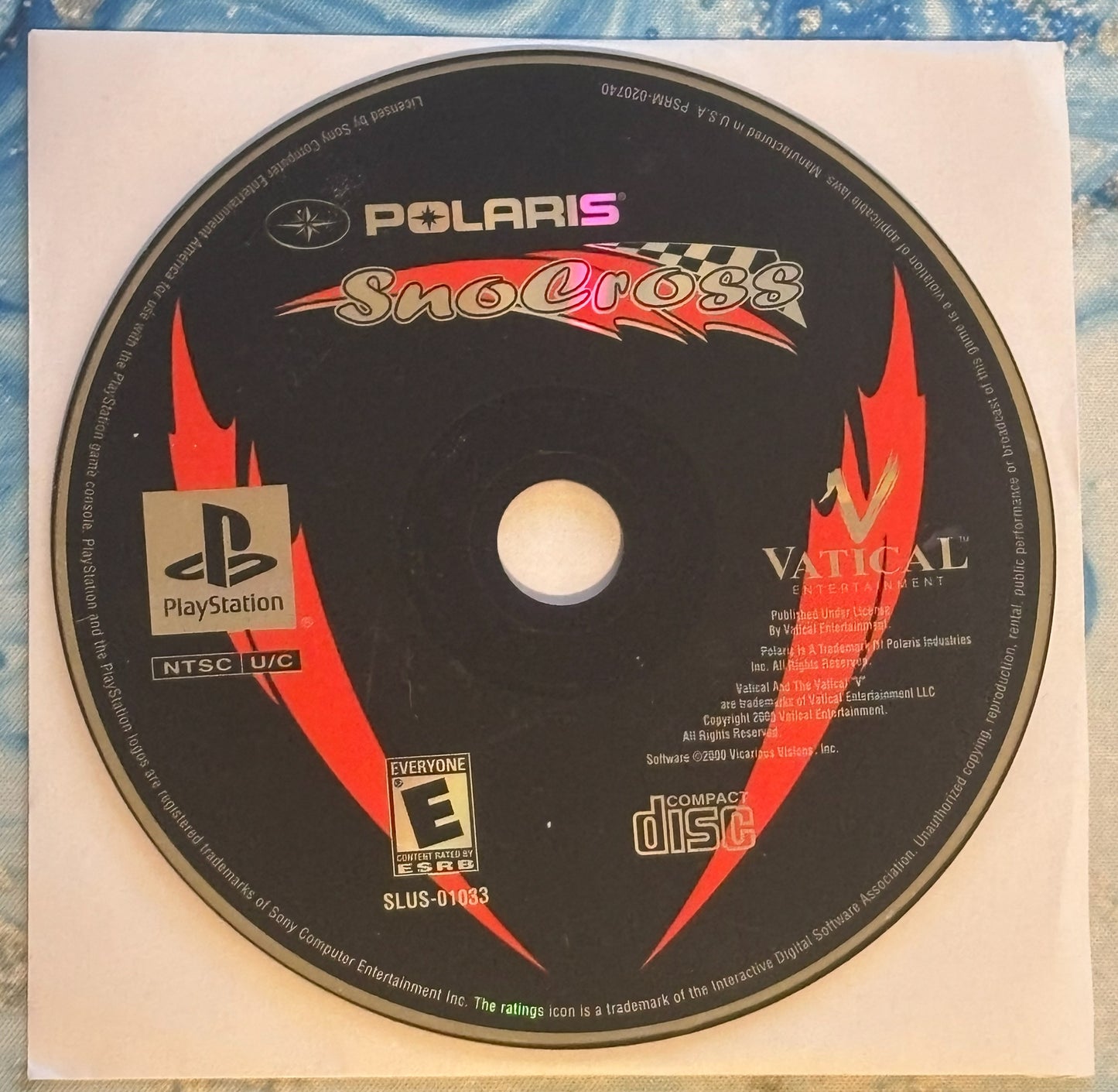 Polaris SnoCross PlayStation game disc on a white background