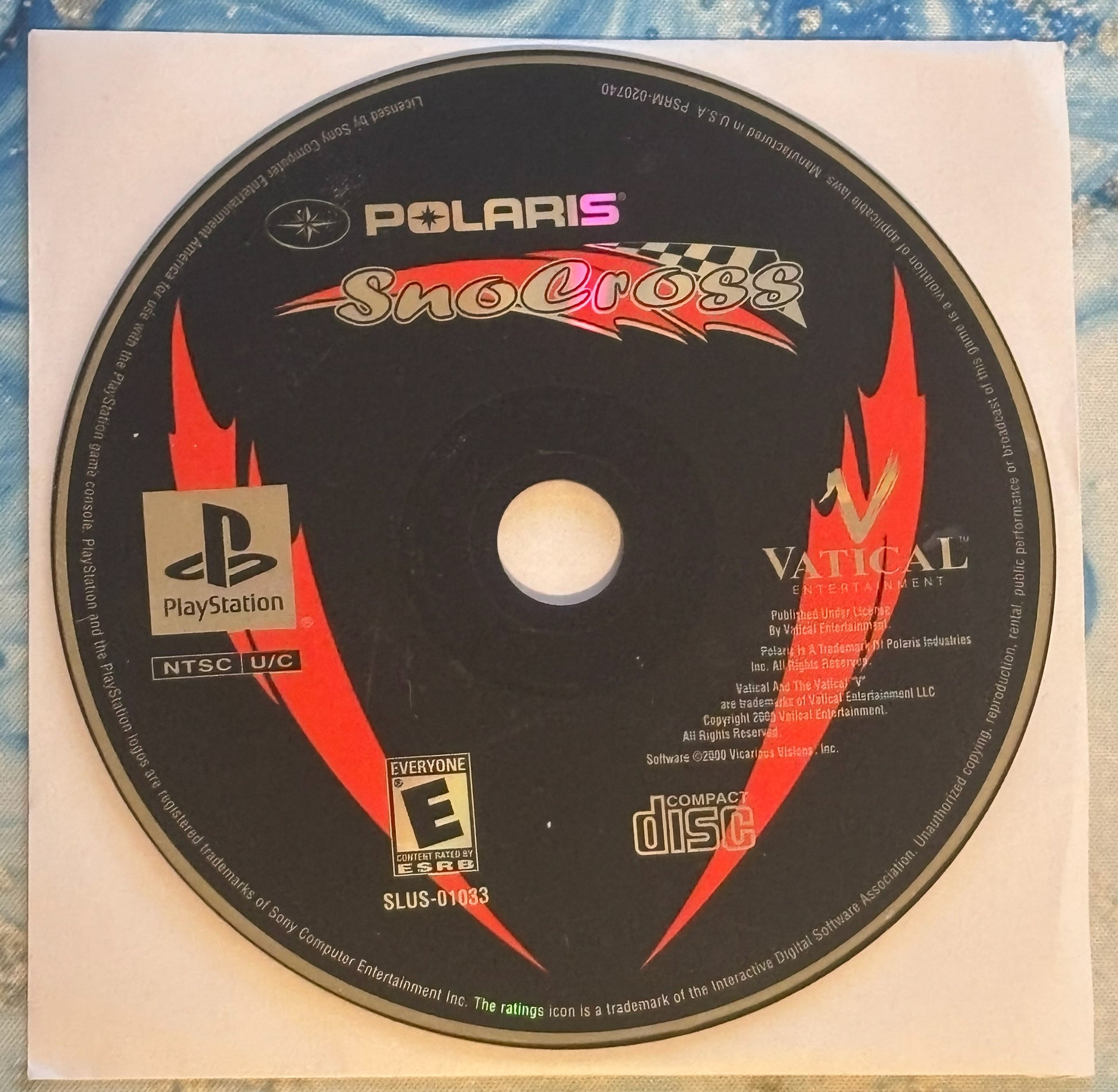Polaris SnoCross PlayStation game disc on a white background