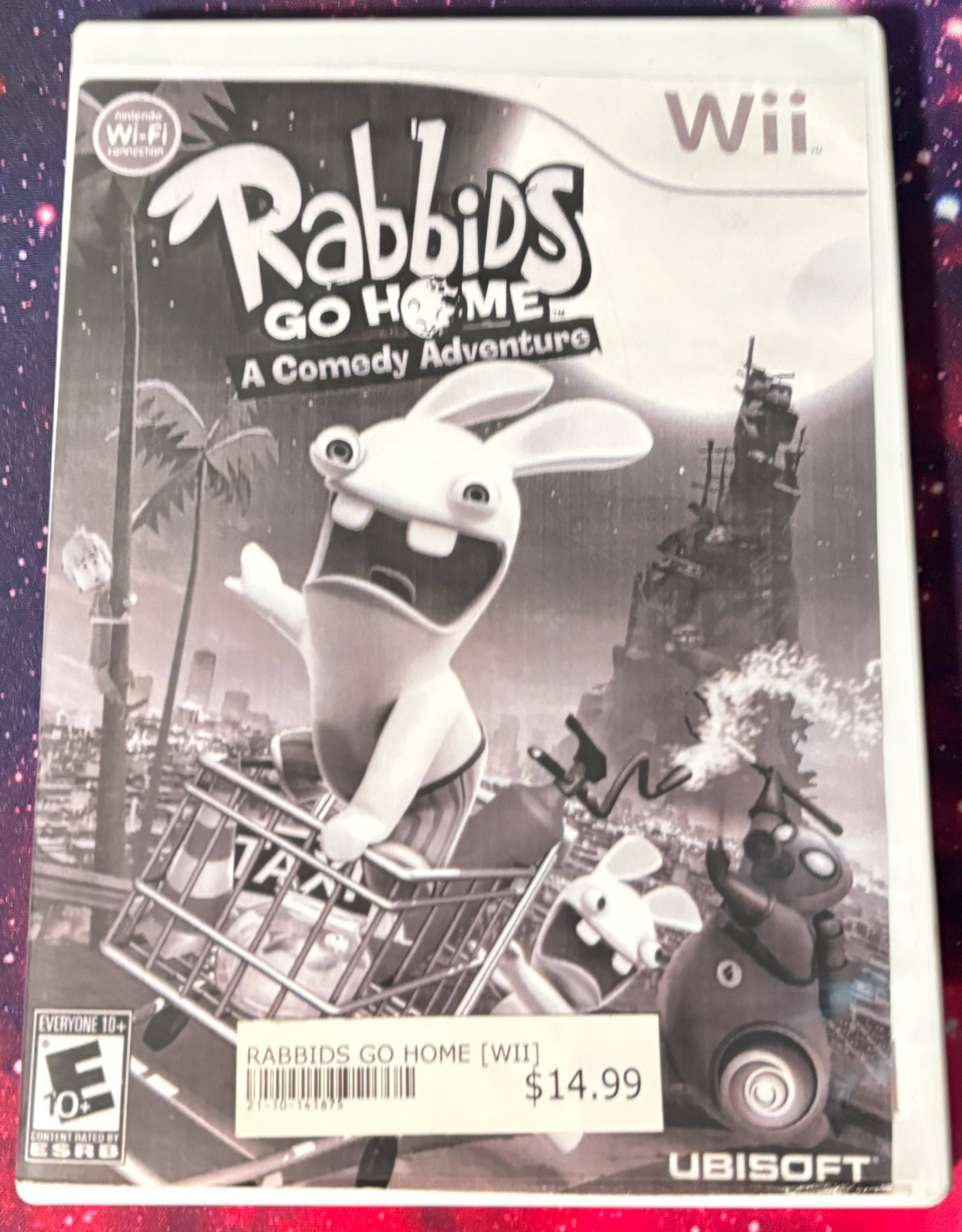 Wii game box for 'Rabbids Go Home' with a cartoon rabbit character on the cover.