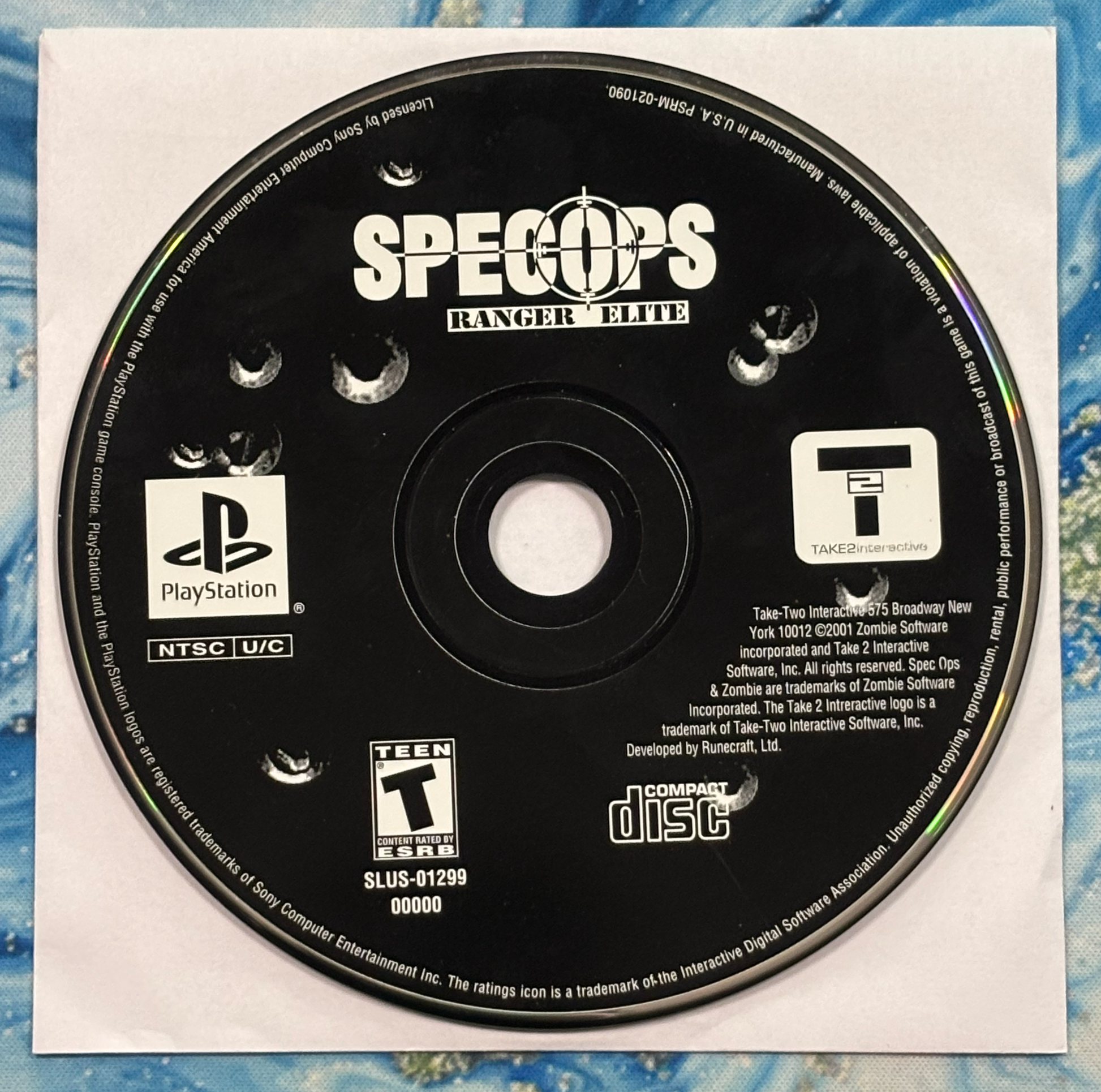 PlayStation game disc labeled 'SPECOPS Ranger Elite' on a textured surface