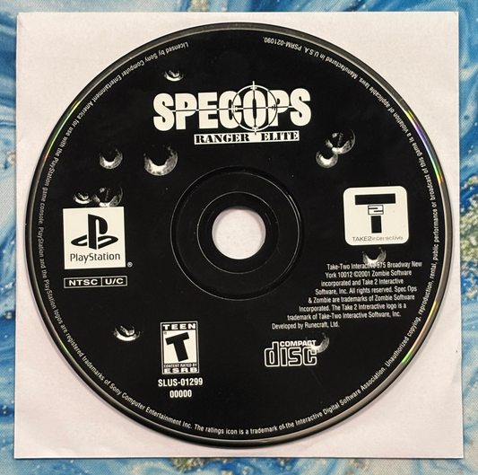 PlayStation game disc labeled 'SPECOPS Ranger Elite' on a textured surface