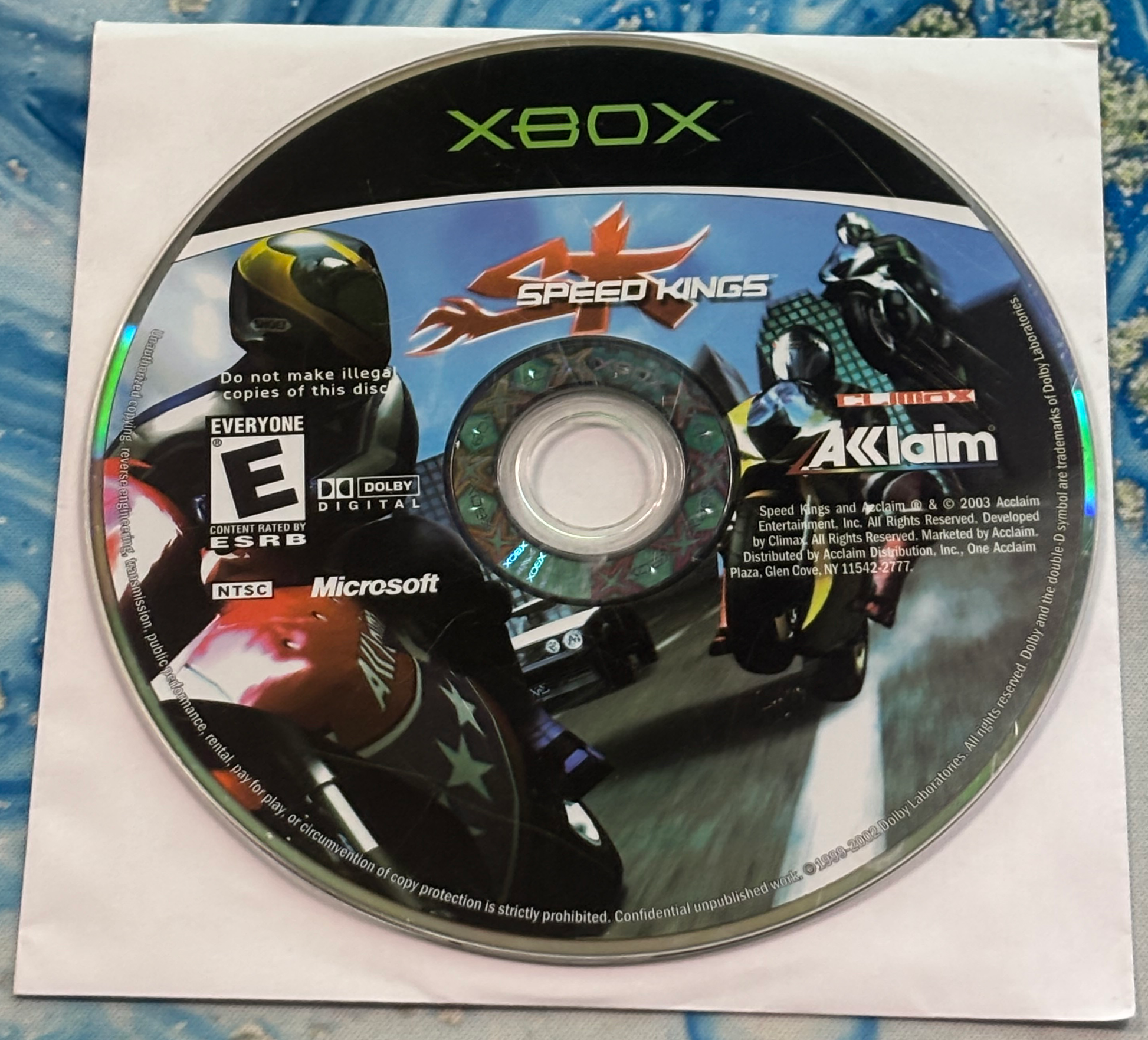 Xbox game disc for '4 Speed Kings' on a white background