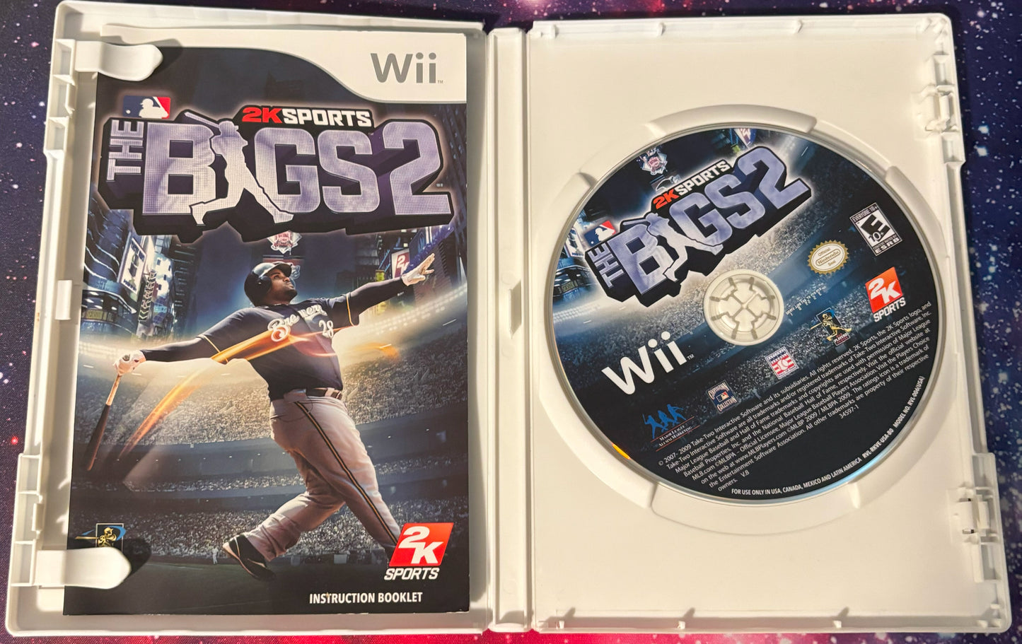 Wii game case titled 'The Bigs 2' with disc and booklet on a colorful background