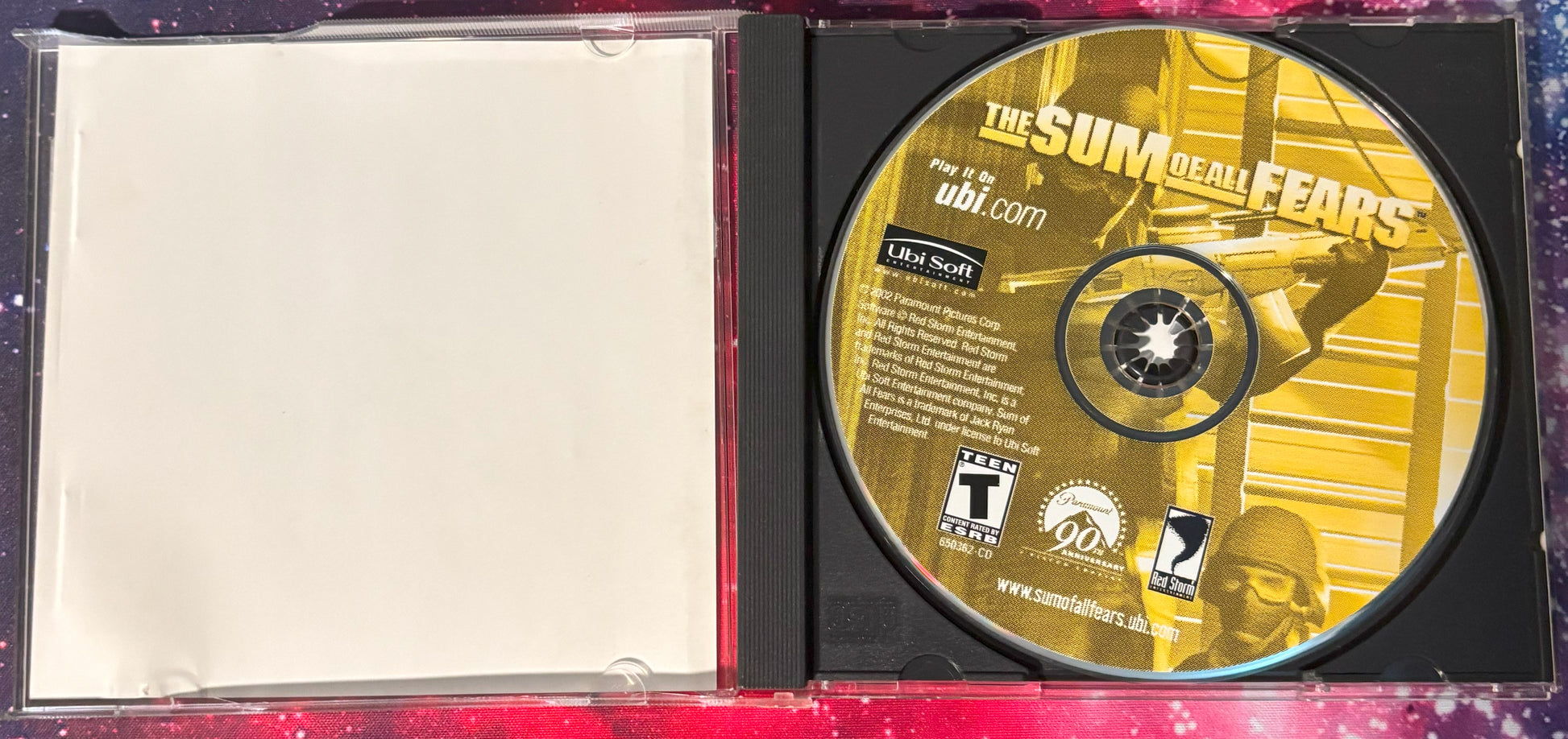 CD in a case with 'The Sum of All Fears' branding