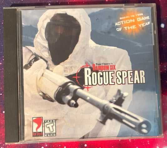 Game case for 'Tom Clancy's Rainbow Six Rogue Spear' on a red and purple gradient background