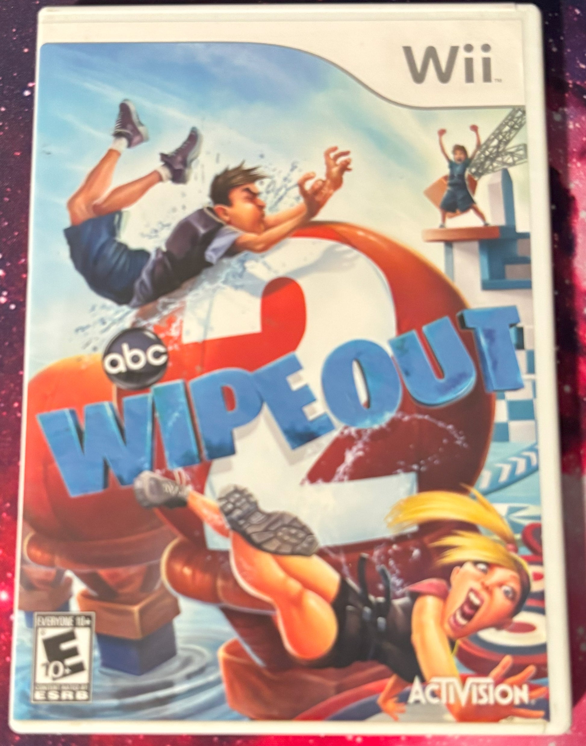 Wii game console cover for 'abc Wipeout' with characters and Activision logo.