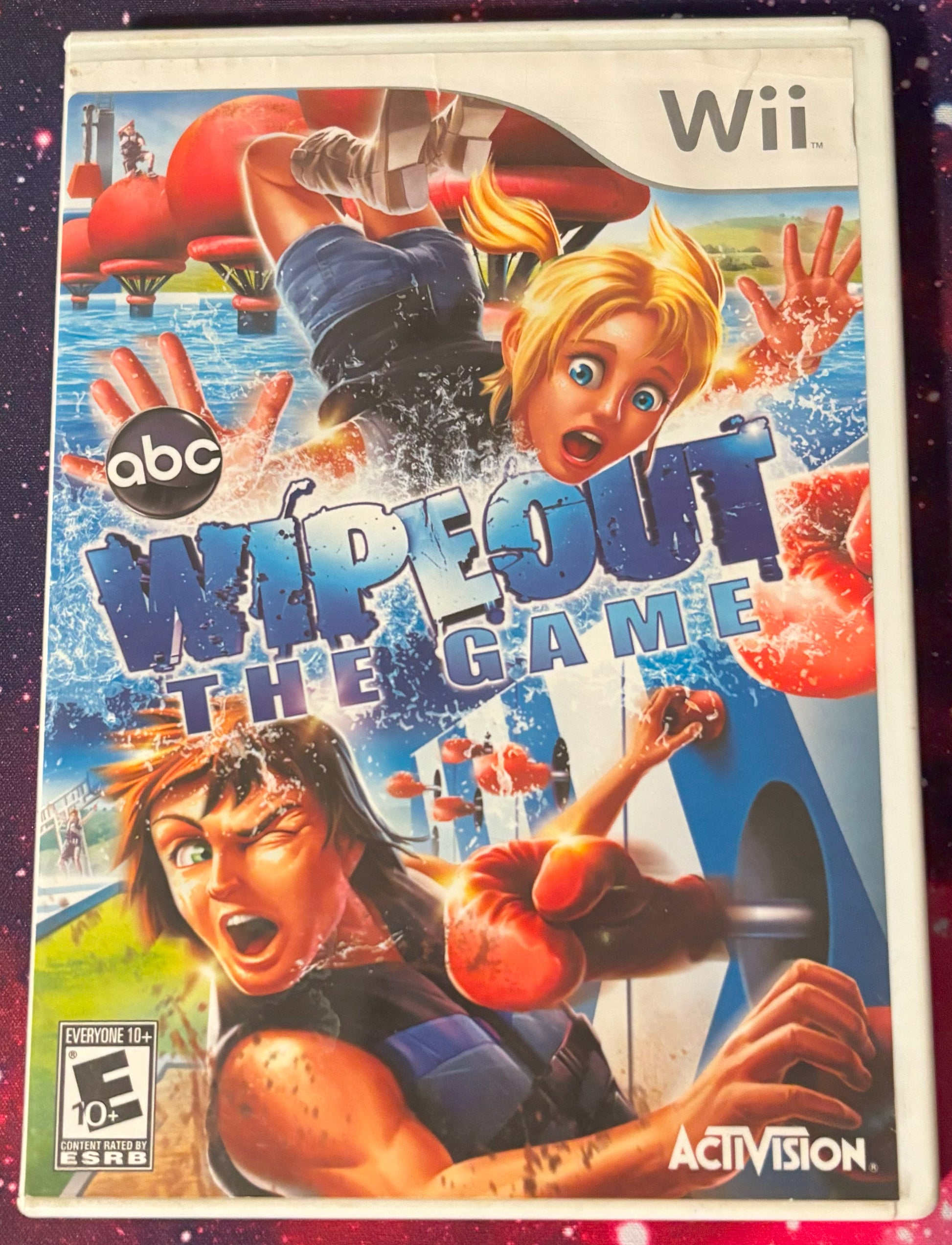 Wii game console cover for 'Wipeout: The Game' with characters andActivision branding.