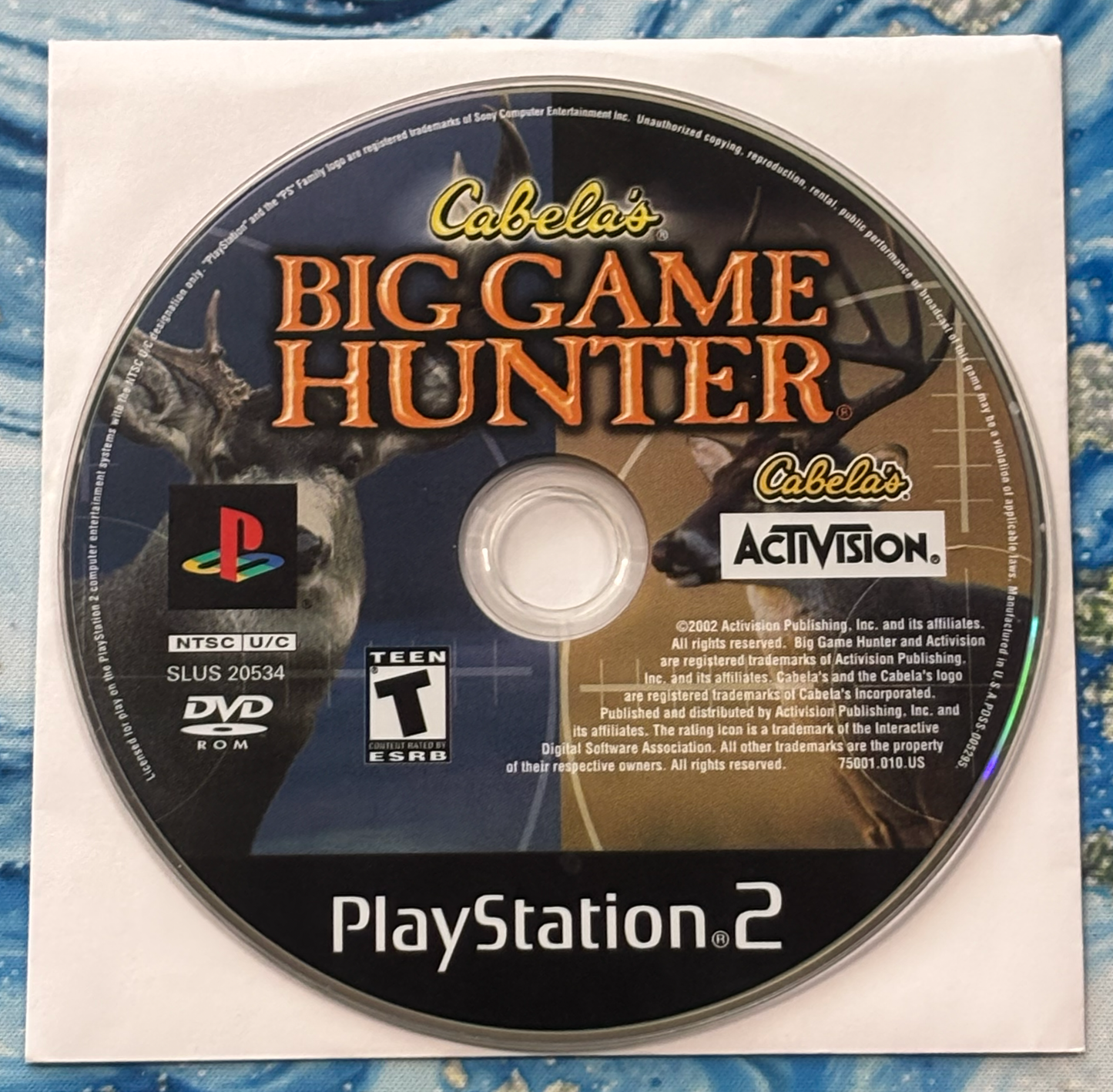 Cabela's Big Game Hunter PlayStation 2 game disc on a white background