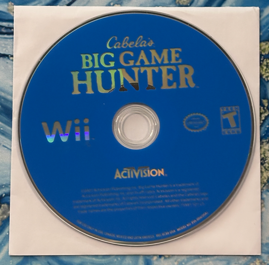 Cabela's Big Game Hunter Wii game disc on a blue and white patterned surface